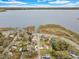 Aerial view showing home's location on a lakefront lot at 803 E Valencia St, Lakeland, FL 33805