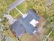 Aerial view showcasing the house's layout and backyard at 803 E Valencia St, Lakeland, FL 33805