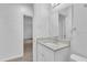 Simple bathroom with white vanity and mirror at 803 E Valencia St, Lakeland, FL 33805