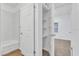Bathroom with linen closet and shower/tub combo at 803 E Valencia St, Lakeland, FL 33805