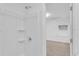 Bright bathroom with shower stall and open view to bedroom at 803 E Valencia St, Lakeland, FL 33805