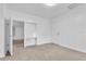 Bright bedroom with built-in shelving and door at 803 E Valencia St, Lakeland, FL 33805