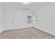 Spacious bedroom with carpet and window at 803 E Valencia St, Lakeland, FL 33805