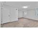 Spacious bedroom with neutral carpeting and ample natural light at 803 E Valencia St, Lakeland, FL 33805