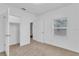 Bright bedroom with closet and window at 803 E Valencia St, Lakeland, FL 33805
