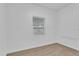 Bright bedroom with window and neutral decor at 803 E Valencia St, Lakeland, FL 33805
