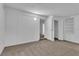 Spacious bedroom with neutral carpeting and large closet at 803 E Valencia St, Lakeland, FL 33805