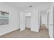 Spacious bedroom with large closet and access to hallway at 803 E Valencia St, Lakeland, FL 33805