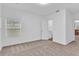 Bedroom with carpet and access to bathroom at 803 E Valencia St, Lakeland, FL 33805