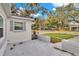 Small front patio with gray stone wall planters and a view of the street at 803 E Valencia St, Lakeland, FL 33805