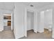 Hallway with access to bedroom and kitchen at 803 E Valencia St, Lakeland, FL 33805