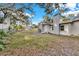 Backyard view of a newly renovated single story home at 803 E Valencia St, Lakeland, FL 33805