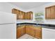 Eat-in kitchen with corner sink and granite countertops at 803 E Valencia St, Lakeland, FL 33805