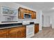 Updated kitchen featuring wood cabinets and granite countertops at 803 E Valencia St, Lakeland, FL 33805