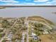 Aerial view of the neighborhood and lake at 803 E Valencia St, Lakeland, FL 33805