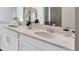 Double vanity bathroom with quartz countertop and modern fixtures at 3141 Zuni Rd, St Cloud, FL 34771