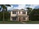 Two-story home with stone accents and landscaping at 3141 Zuni Rd, St Cloud, FL 34771