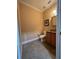 Clean bathroom with tile flooring, vanity, and toilet at 4200 Joslyn Ln, Lady Lake, FL 32159