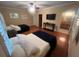 Bedroom with two twin beds and hardwood floors at 4200 Joslyn Ln, Lady Lake, FL 32159