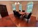 Formal dining room with hardwood floors and large windows at 4200 Joslyn Ln, Lady Lake, FL 32159