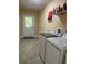 Laundry room with washer, dryer, and exterior access at 4200 Joslyn Ln, Lady Lake, FL 32159