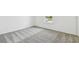Bedroom with neutral carpet, natural lighting and electrical outlets at 1622 Ruby Ln, Lake Alfred, FL 33850