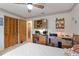 Bedroom featuring a desk area and lots of storage space at 4680 Poinciana Dr, Indian Lake Estates, FL 33855