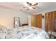 Spacious bedroom with king-size bed and ample closet space at 4680 Poinciana Dr, Indian Lake Estates, FL 33855