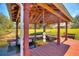 Private boat dock with covered area and lift at 4680 Poinciana Dr, Indian Lake Estates, FL 33855