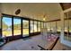 Spacious Florida room with water views and seating at 4680 Poinciana Dr, Indian Lake Estates, FL 33855