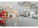 Large garage with workshop area and laundry at 4680 Poinciana Dr, Indian Lake Estates, FL 33855