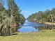 Tranquil lake view from the property at 4680 Poinciana Dr, Indian Lake Estates, FL 33855