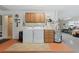 Garage laundry room with washer, dryer, and cabinets at 4680 Poinciana Dr, Indian Lake Estates, FL 33855