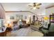 Living room with two armchairs and a sofa at 4680 Poinciana Dr, Indian Lake Estates, FL 33855