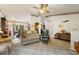 Inviting living room showcasing comfortable seating and classic décor at 4680 Poinciana Dr, Indian Lake Estates, FL 33855