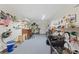 Spacious workshop with ample storage and workbench at 4680 Poinciana Dr, Indian Lake Estates, FL 33855