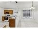 Functional kitchen with a breakfast bar and a view of the dining area at 515 Torres Pl, Lady Lake, FL 32159