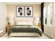 Spacious bedroom with a comfortable bed and neutral color palette at 7310 Ivy Tendril Ave, Orlando, FL 32829