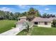 Two-story house with a large backyard and palm trees at 10420 Vista Del Sol Cir, Clermont, FL 34711