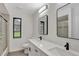 Updated bathroom with dual sinks and quartz countertops at 10420 Vista Del Sol Cir, Clermont, FL 34711