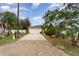 Single-story home with attached garage and driveway at 1504 Fort Meade Pl, Poinciana, FL 34759