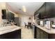 Modern kitchen featuring stainless steel appliances and ample counter space at 1504 Fort Meade Pl, Poinciana, FL 34759