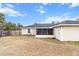 Spacious backyard with screened porch at 20 Hemlock Trl, Ocala, FL 34472