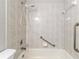 Bathroom with shower/tub combo and grab bars at 20 Hemlock Trl, Ocala, FL 34472