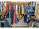 Large walk-in closet with ample hanging space and shelving at 20 Hemlock Trl, Ocala, FL 34472