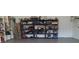 The garage has a metal shelving system to help organize all of your home and garden tools at 20 Hemlock Trl, Ocala, FL 34472