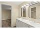 Bathroom with double vanity and updated fixtures at 2519 State Park Rd, Lakeland, FL 33805