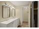 Clean bathroom, double vanity, and linen closet at 2519 State Park Rd, Lakeland, FL 33805