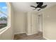 Simple bedroom with wood-look floors and a window at 2519 State Park Rd, Lakeland, FL 33805