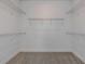 Large walk-in closet with wire shelving at 6805 Sw 90Th Loop, Ocala, FL 34476